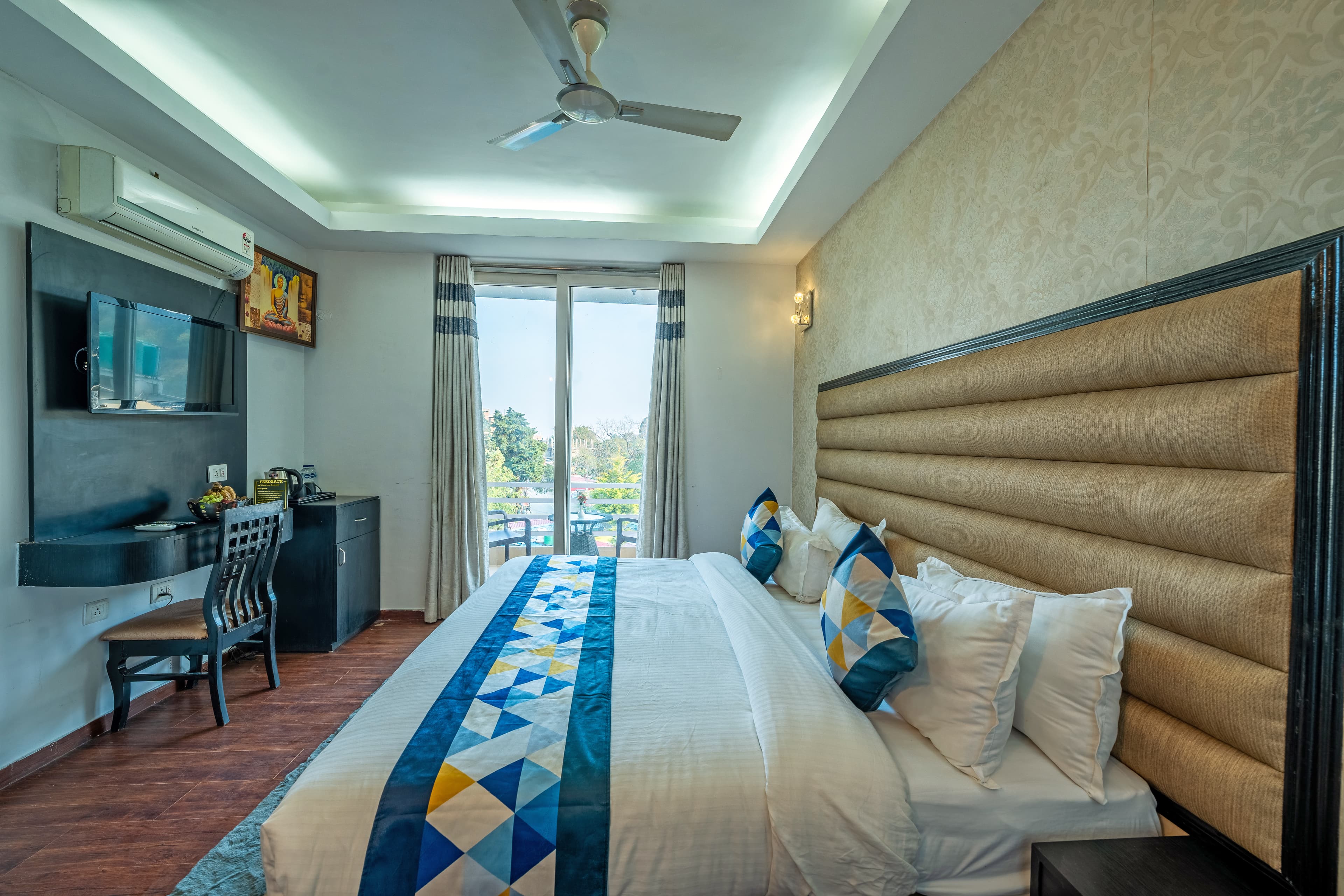 Luxury Room with a king bed and private balcony at The Royal Court by Vikalp